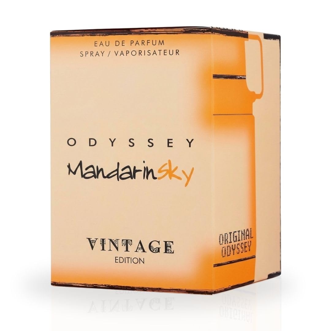 Sterling Parfums Odyssey Mandarin Sky Vintage Edition spray action showing diffusion