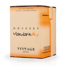 Sterling Parfums Odyssey Mandarin Sky Vintage Edition spray action showing diffusion