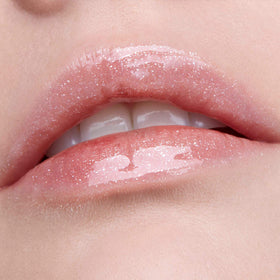 Stila Plumping Lip Glaze Kitten swatch highlights gloss, color, and shine