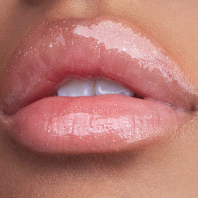 Stila Plumping Lip Glaze Kitten tube with wand ready for precise, smooth application