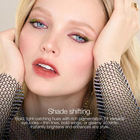 Eye look using stila Chroma-Flash liner to define lash line with chrome shine.
