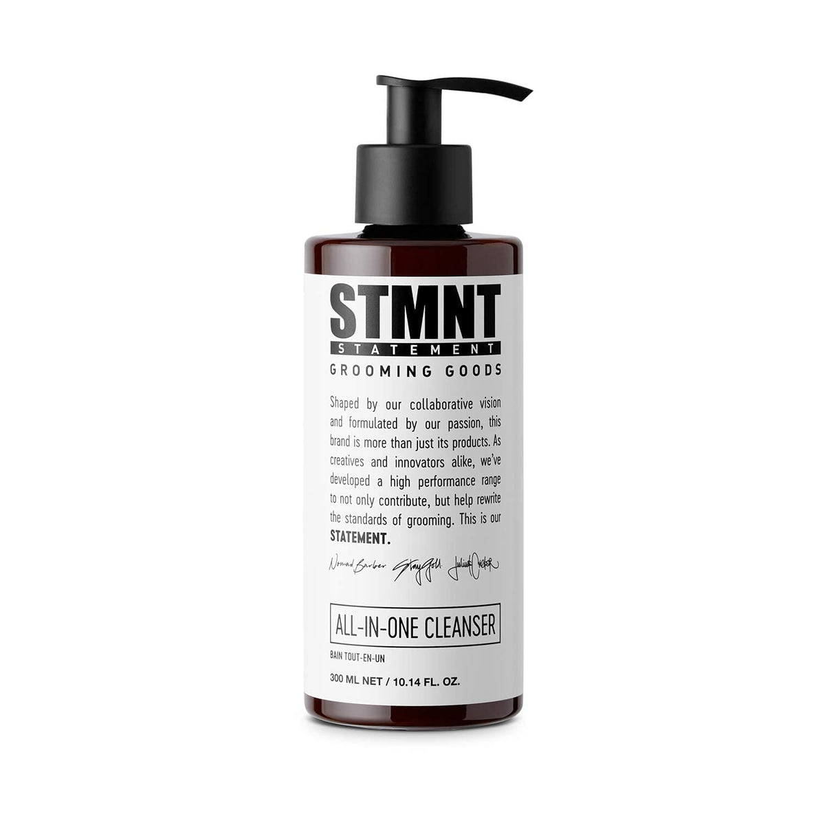 STMNT All-In-One Daily Cleanser bottle pouring for full body and hair cleanse.