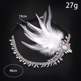 STONEFANS silver headband with feathers enhances vintage outfits.