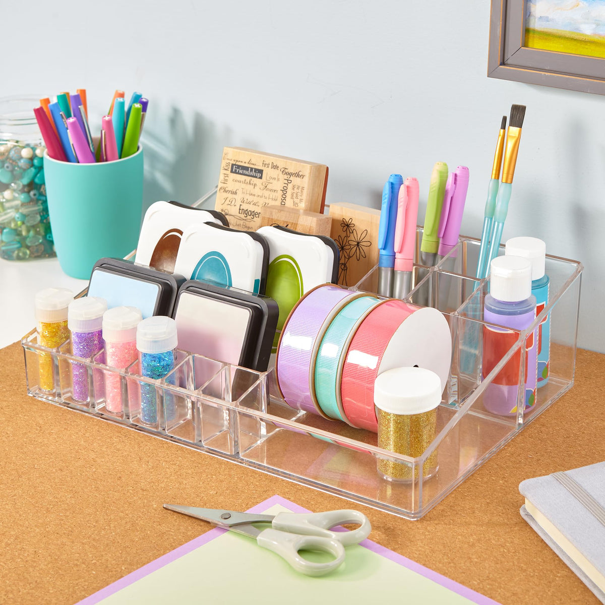 STORi Audrey clear vanity organizer holds foundation bottles neatly on the counter