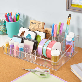 STORi Audrey clear vanity organizer holds foundation bottles neatly on the counter