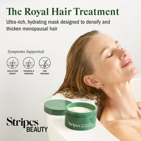 Hands massaging Crown Pleaser into hair to boost thickness and manageability