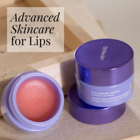 StriVectin lip mask jar open reveals creamy texture ready for hydration.