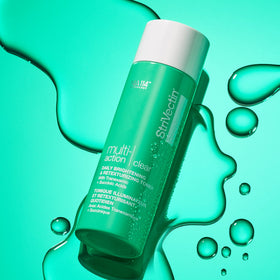 StriVectin Multi Action Clear toner on bathroom shelf signals daily skincare ritual.
