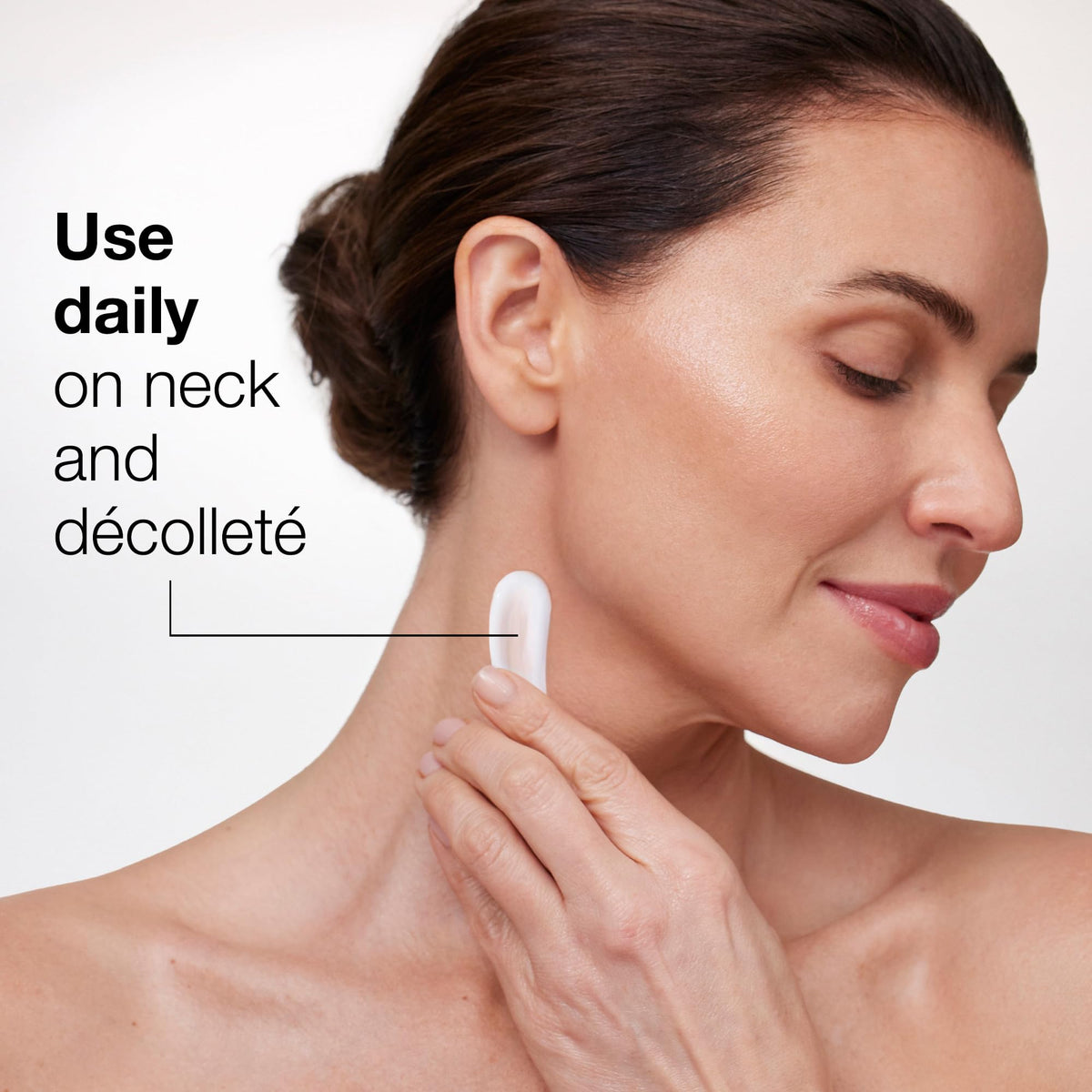 Neck area treatment using StriVectin neck cream with SPF.