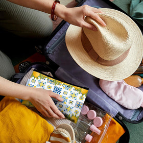 Stuffygreenus lemon makeup bag keeps items protected during trips.