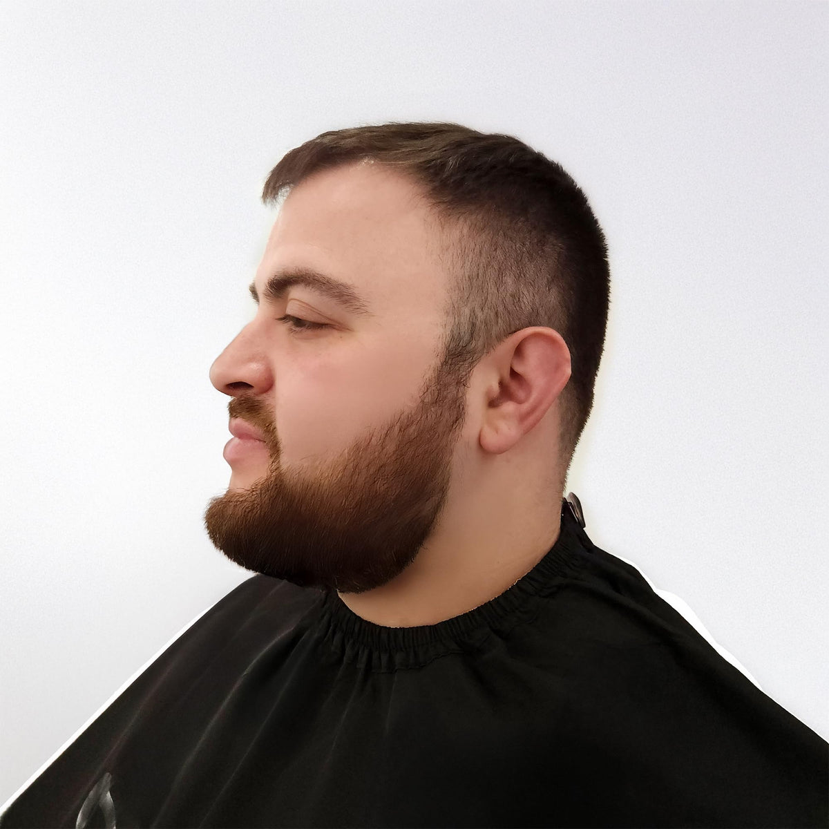 StyleCraft barber cape durable stitching designed for long-lasting salon use.