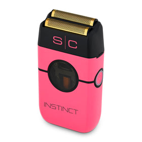 StyleCraft Instinct shaver foil close-up featuring gold titanium foil and cutter action