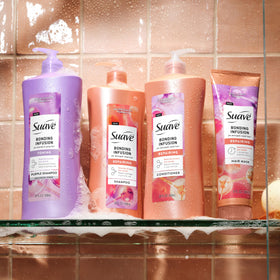 Suave Bonding Infusion Repairing Shampoo 28 oz bottle with pump in four-pack.