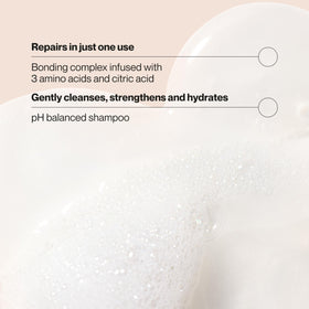 Suave Bonding Infusion Repairing Shampoo lather texture shows cleansing and conditioning in one step.