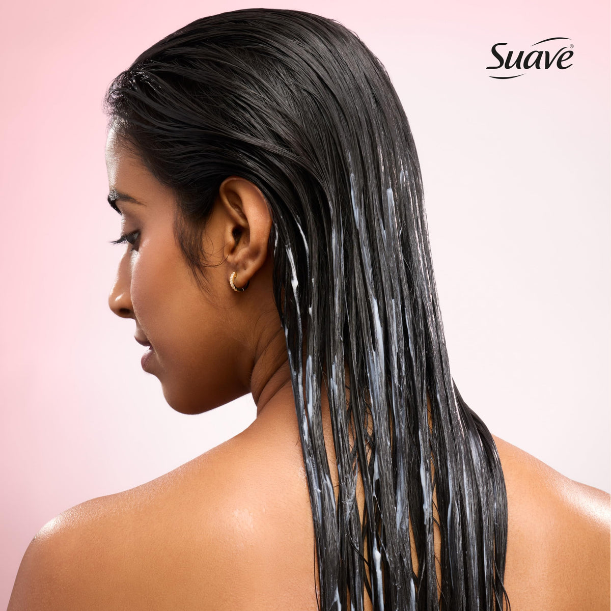 Suave Hydra Gloss Conditioner jar closeup highlights rich, creamy texture and lush slip.