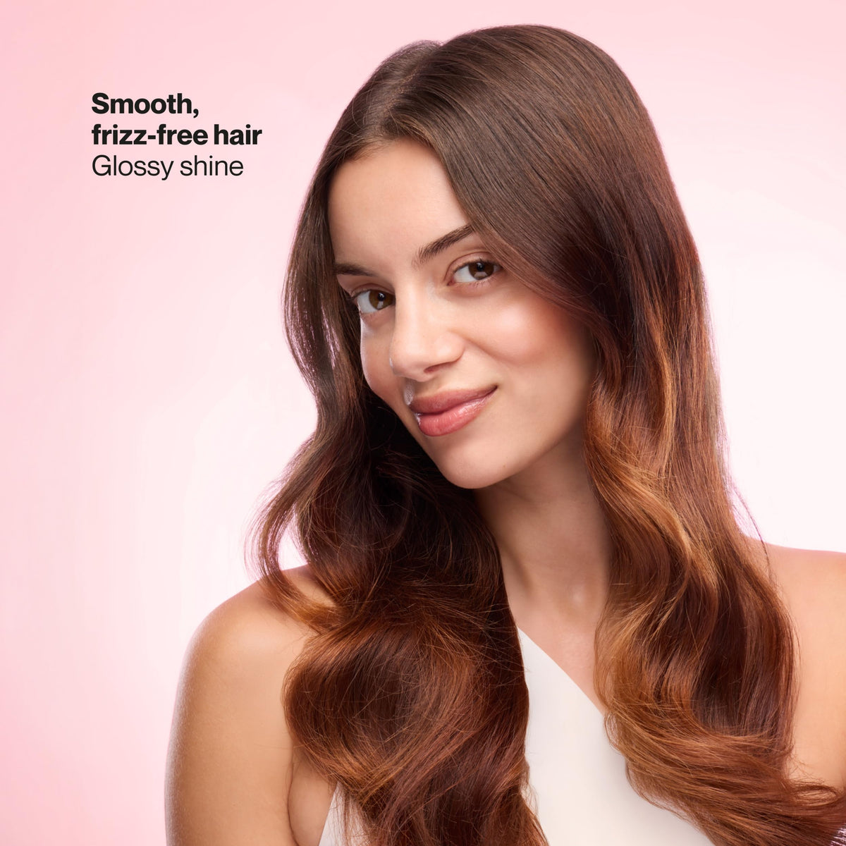 Shampoo bottle label highlights glycolic acid and camellia flower oil.