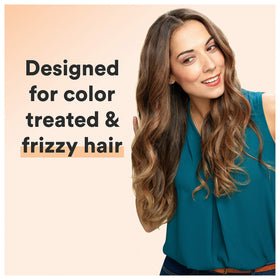 Suave Keratin Infusion Color Care Conditioner store display emphasizes color-loving care.