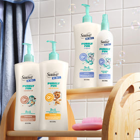 Kid smiles after rinse with Suave Kids 2-in-1