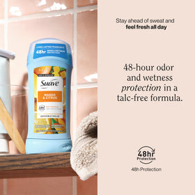 Suave Mango Citrus deodorant stick in use during a morning routine.