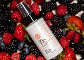 Suavecita Argan Silkening Serum dropper applying on hair for smooth moisture.