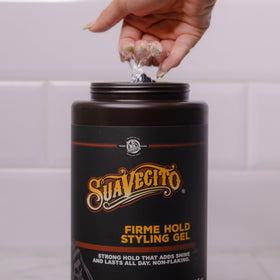 Suavecito Firme Hold Gel texture close-up while styling hair with control.