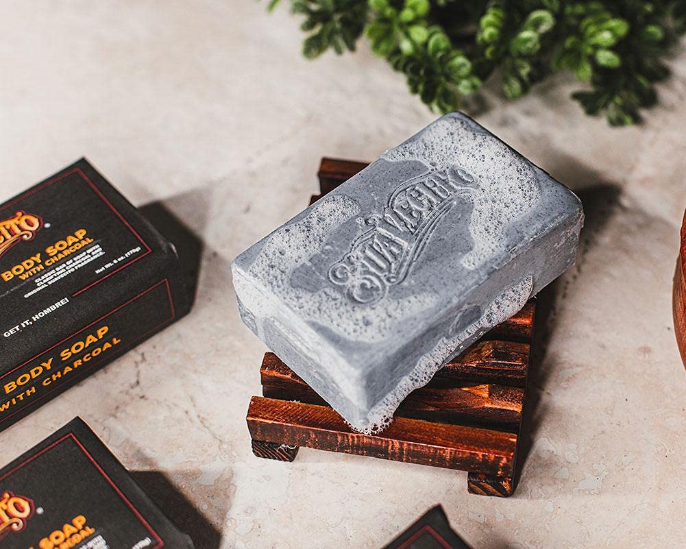 Original Suavecito scent emphasized with a fresh masculine fragrance close-up.