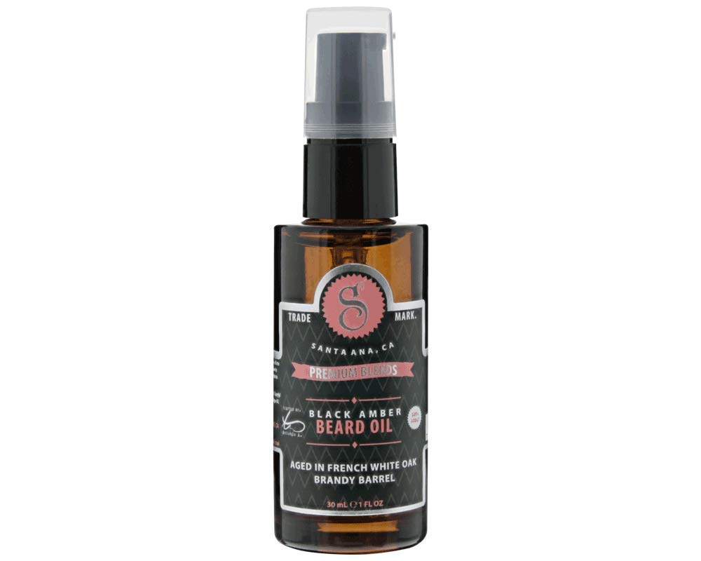 Suavecito Premium Blends Beard Oil bottle with pour; beard softened, skin hydrated.