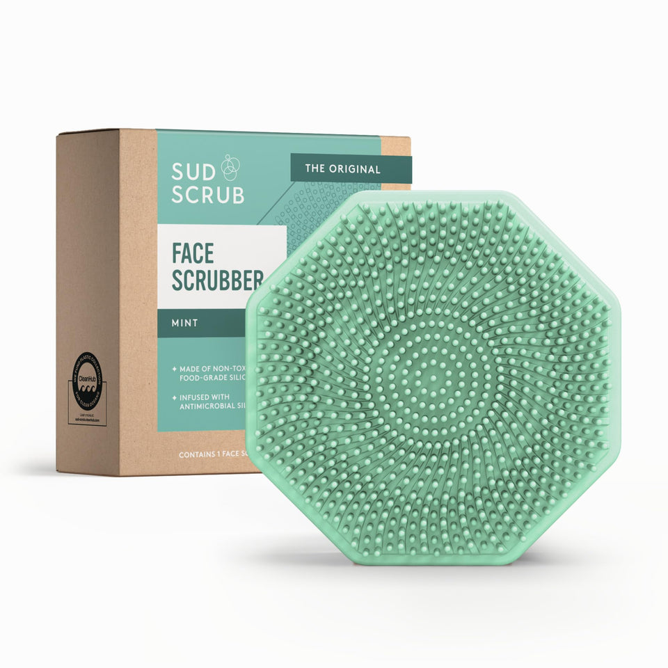 Sud Scrub antimicrobial silicone face scrubber in mint for gentle cleansing.