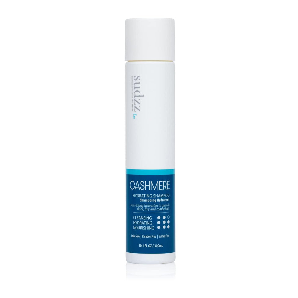SUDZZFX Cashmere Hydrating Shampoo bottle on shelf, color-safe moisture for all hair types.