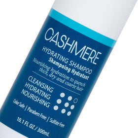 Close-up of SUDZZFX Cashmere Hydrating Shampoo pump dispensing sulfate-free cleansing.