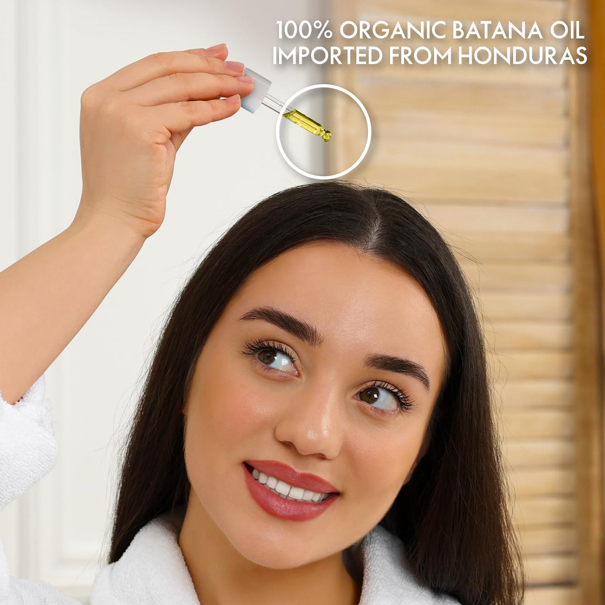 Close-up of batana oil in the glass dropper highlighting clarity.