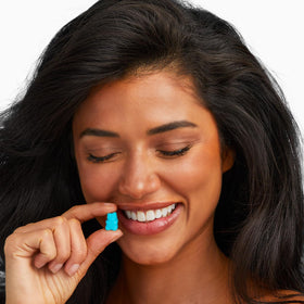 SugarBearHair vegan vitamin bottle shows three-month supply for daily routine