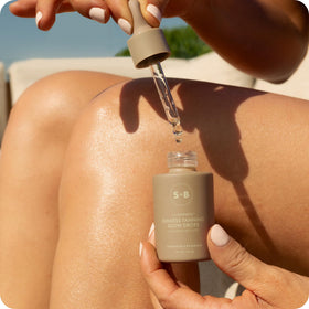 Forearm swatch showing buildable shade from light to bronze