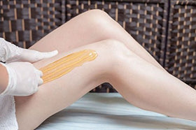 Sugaring kit box with how-to video thumbnail suggests accessible guidance