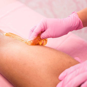 Sugaring kit with strips and sticks shown for quick at-home hair removal