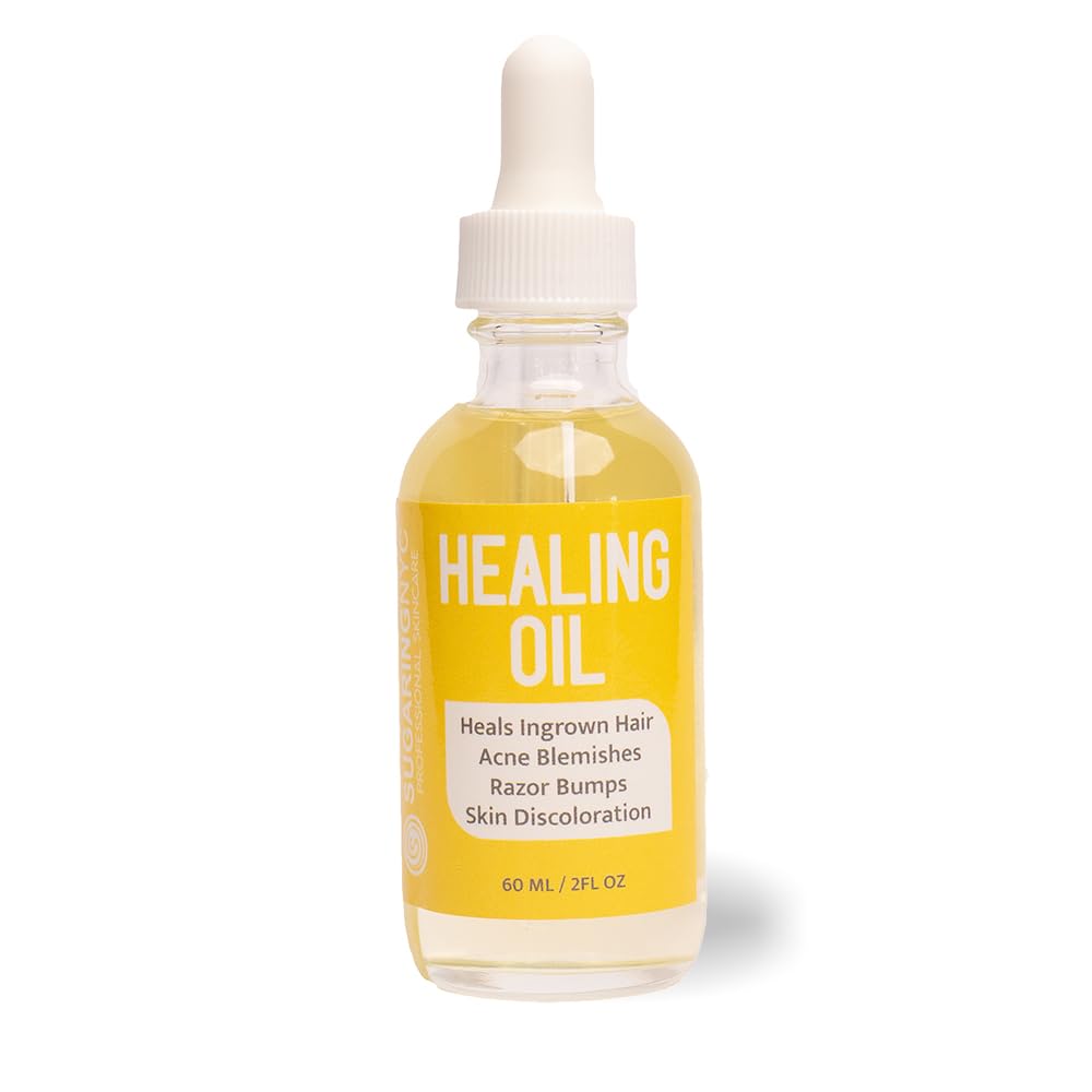 Sugaring NYC Healing Oil bottle being poured after sugaring for soothing skin.