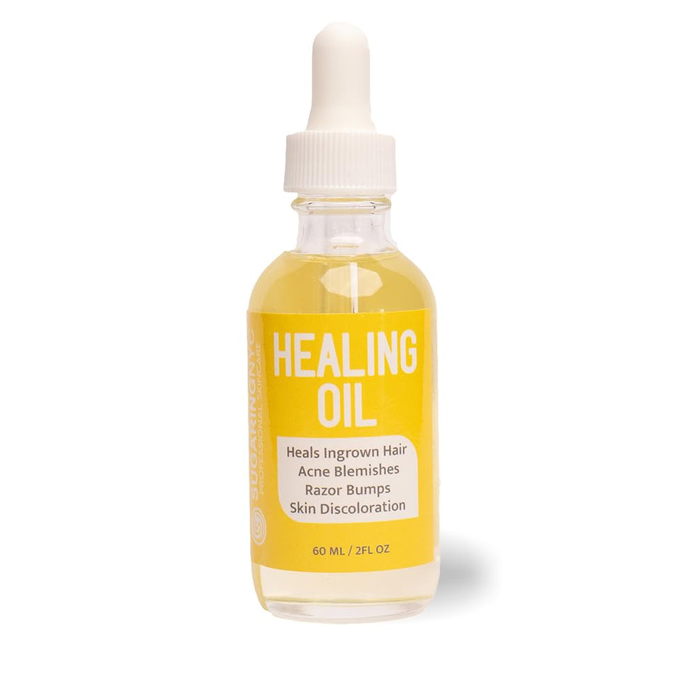Sugaring NYC Healing Oil bottle being poured after sugaring for soothing skin.
