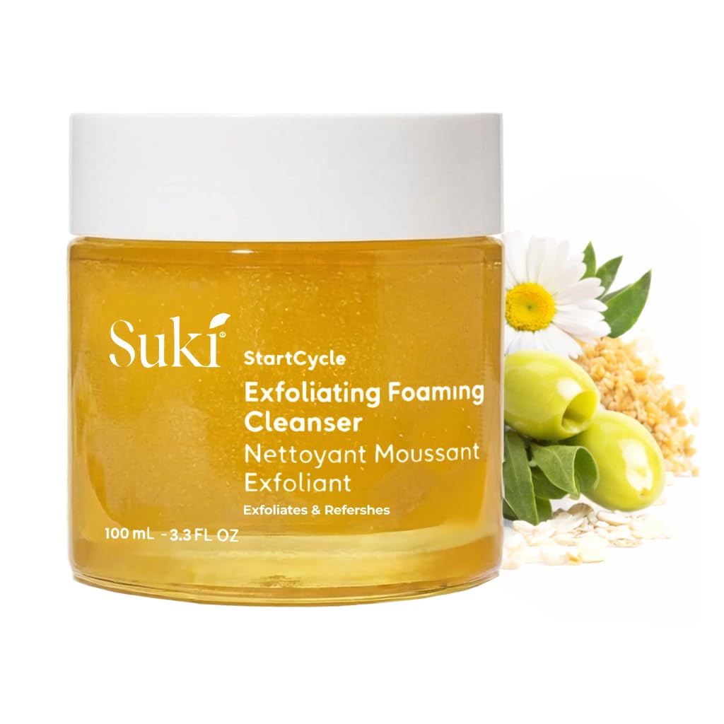 Suki Skincare Exfoliate Foaming Cleanser bottle pouring for gentle exfoliation and radiant skin.