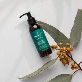 Sukin Super Greens facial moisturiser label closeup highlights botanicals for nourished skin.