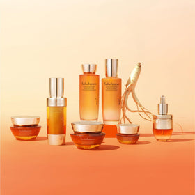 Hands applying toner with gentle press for even absorption