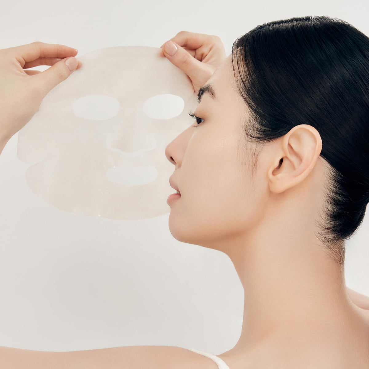 Sulwhasoo First Care Activating Sheet Mask on skin delivery of cooling hydration.