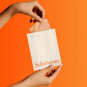 Sulwhasoo First Care Activating Sheet Mask on face demonstrates cooling, refreshing hydration.