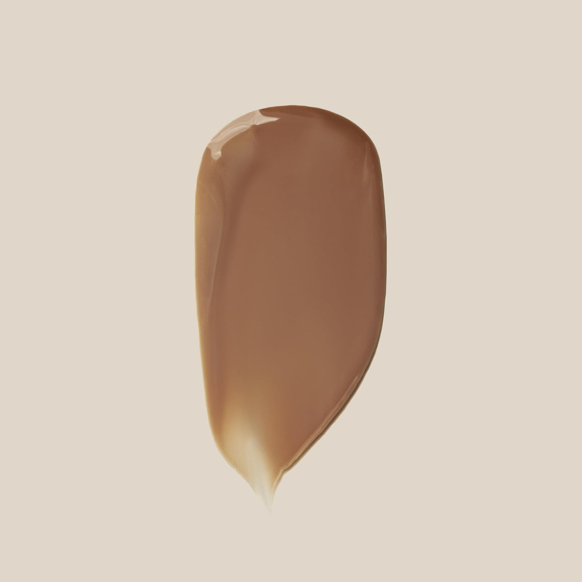 Summer Fridays Sheer Skin Tint cap closeup highlighting travel-friendly packaging for on-the-go touchups.