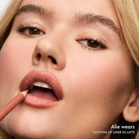 Latte lip liner applied on lips for clean, long-lasting definition.