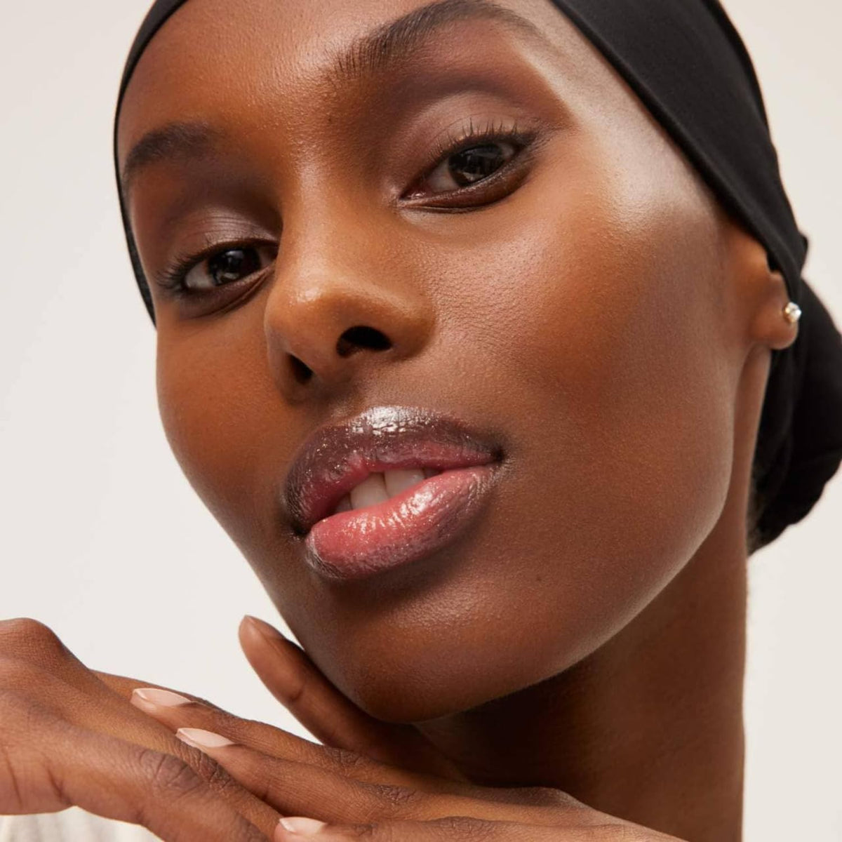 Open cap view of Summer Fridays Lip Butter Balm showing color
