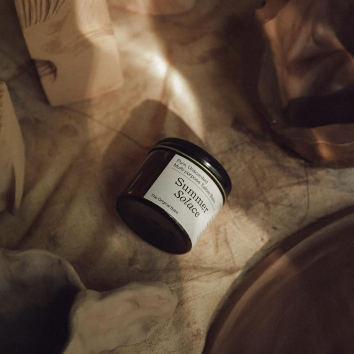 Summer Solace Tallow Balm creamy texture close-up shows rich, easy-to-apply moisture.
