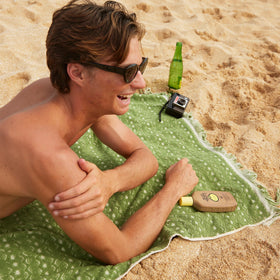 Close-up texture of Sun Bum SPF 50 lotion for smooth application.