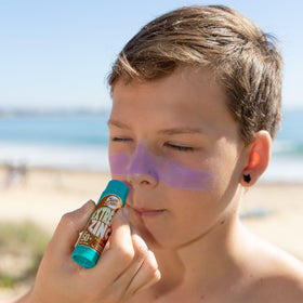 Sun Zapper Extreme Zinc Sunscreen Stick highlights the purple barrier for coverage visibility.