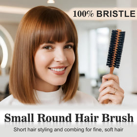 SUNBIRD round brush with natural bristles detangles and adds shine.