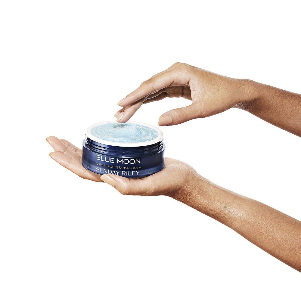 Eye makeup removal with Sunday Riley balm on delicate eye area.